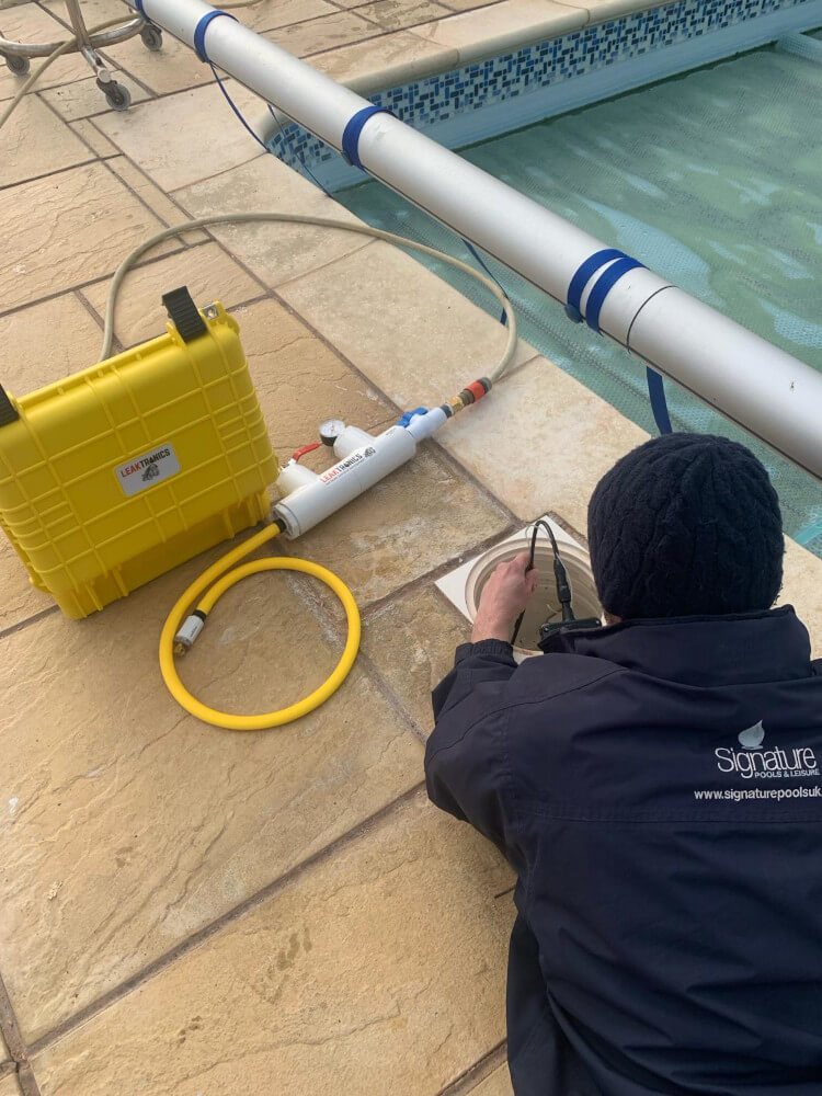 Man working pool water treatment