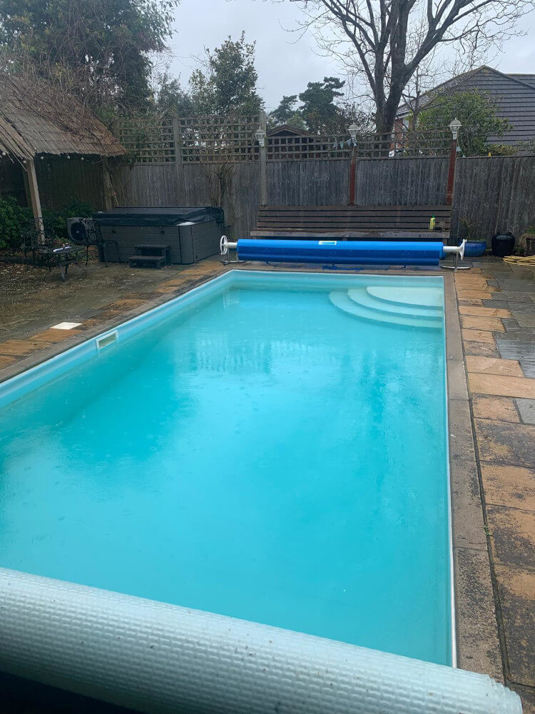 Opened pool cover