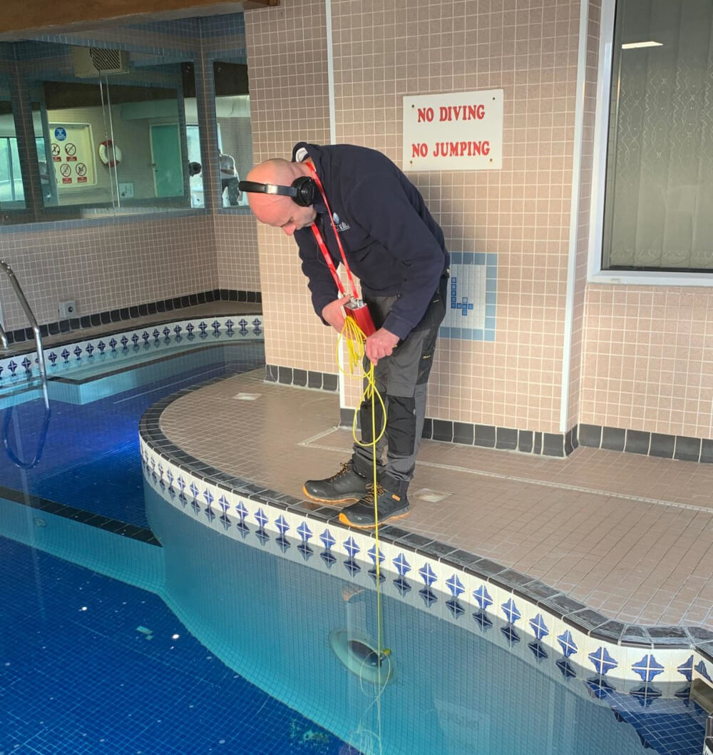 Man testing a local pool