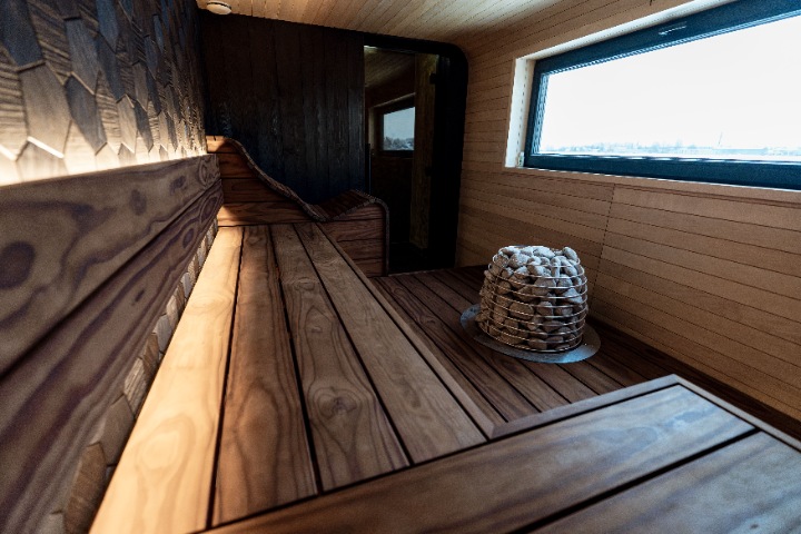 modern wooden steam room with heater